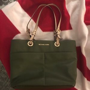 Michael Kors green leather purse. Barely used!!